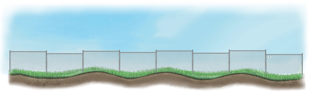 A stepped fence on sloped ground with a Retaining Wall