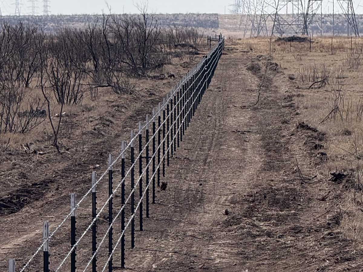 Fence with Straight-Line Barbed Wire Fence with T-Posts – Agricultural Fence Installation on Rural Property in Fort Worth, TX