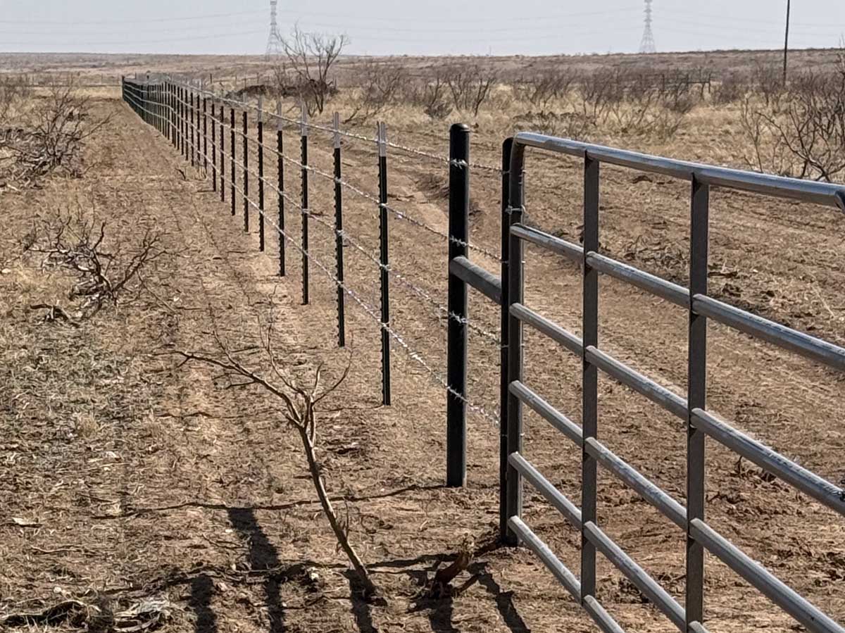 Fence with Barbed Wire Fence with Entry Gate – Secure Livestock Access Point for Agricultural Land in Fort Worth, TX