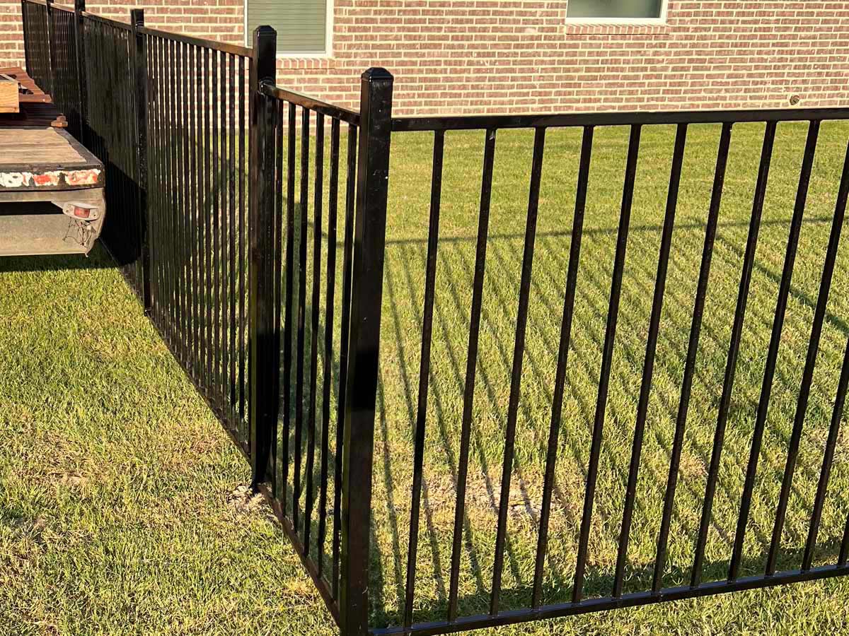 Fence with Black Aluminum Fence Installation on Residential Lawn in Fort Worth, Texas in Fort Worth, TX