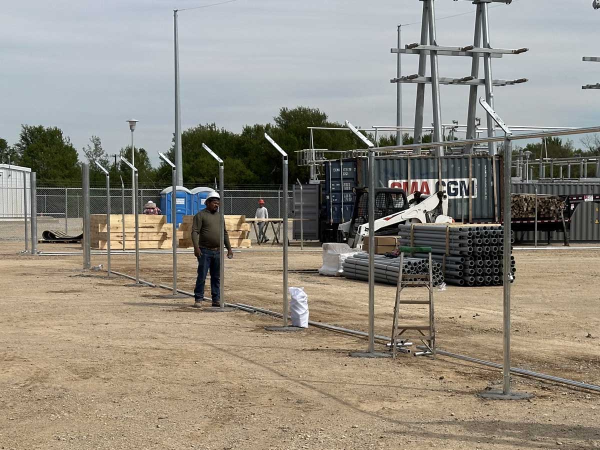 Fence with Industrial Fence Installation in Progress – Galvanized Framework Setup at Utility Site in Fort Worth, TX
