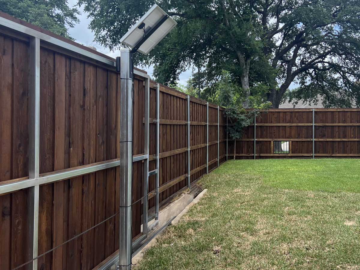 Fence with Estate Gate with Solar-Powered Access Control | Fort Worth, TX Fence Experts in Fort Worth, TX
