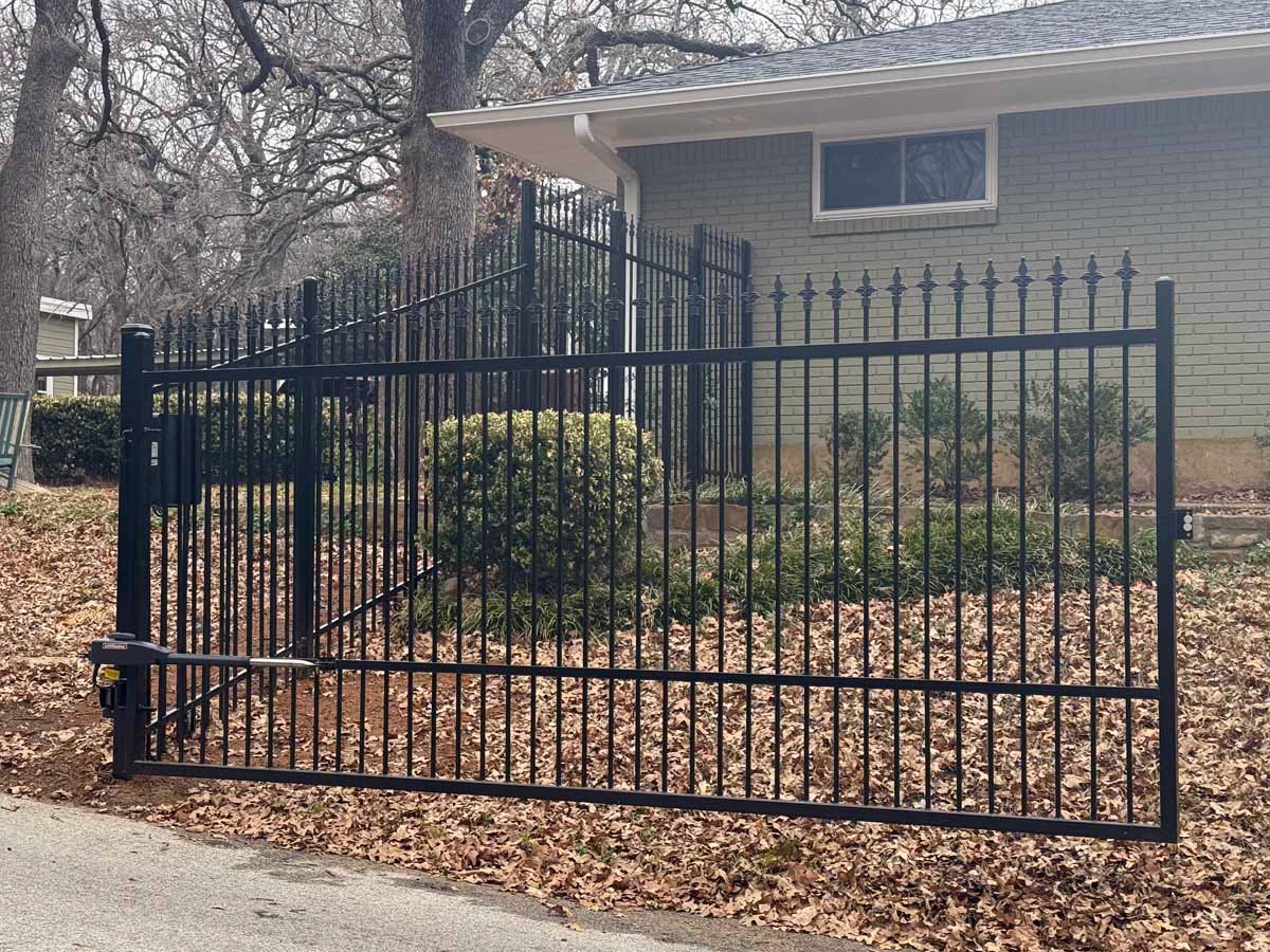 Fence with Automated Wrought Iron Driveway Swing Gate with Decorative Pickets – Secure Residential Entry System in Fort Worth, TX