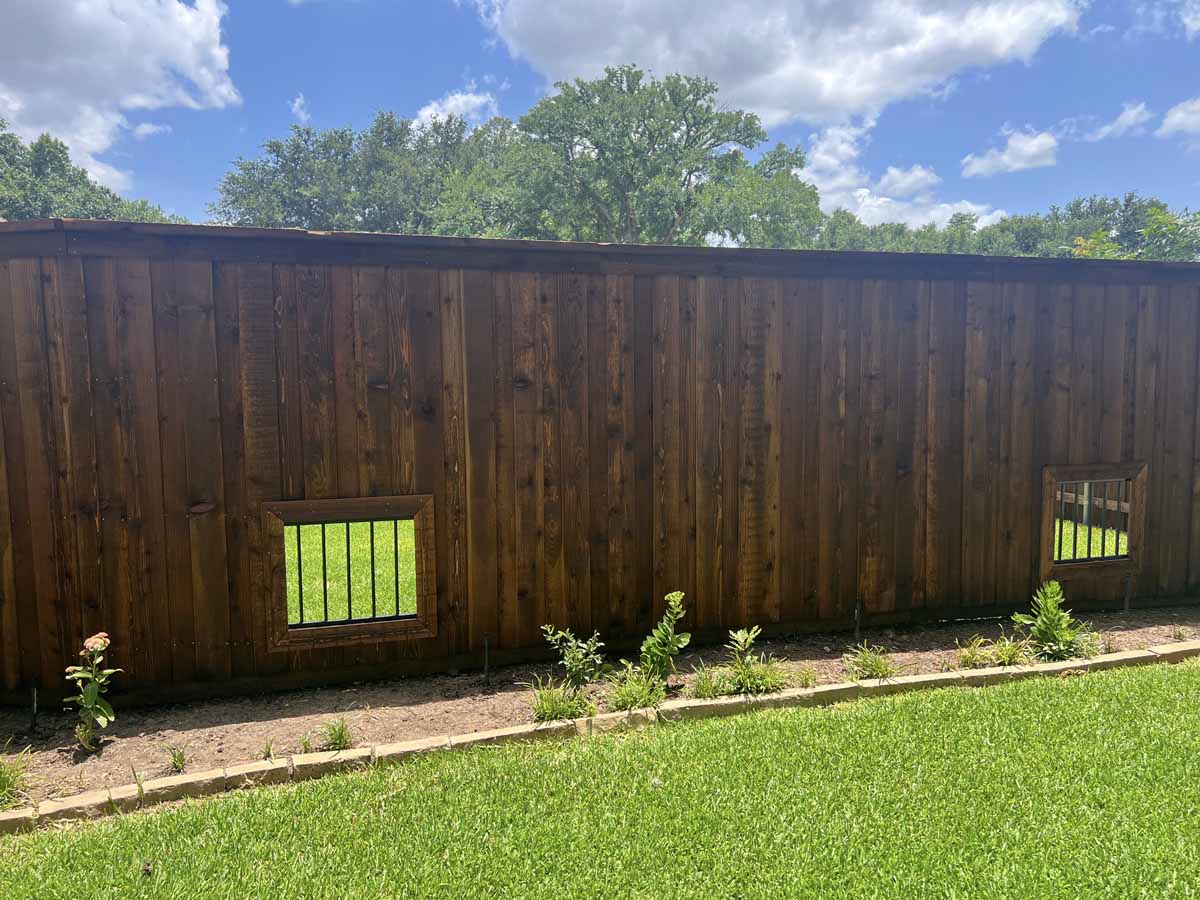 Fence with Wood Privacy Fence with Built-In Dog Windows – Pet-Friendly Backyard Fence Design in Fort Worth, TX